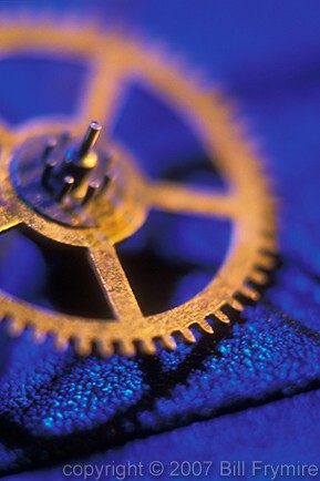 gold-gear-on-blue-closeup.jpg