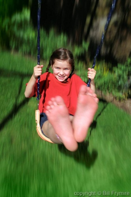 girl on a swing copyright Bill Frymire Nov. 2004