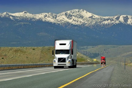 Transport Trucks near La Grande. Oregon, USA. Interstate 84 - up hill