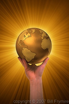 hand holding golden globe