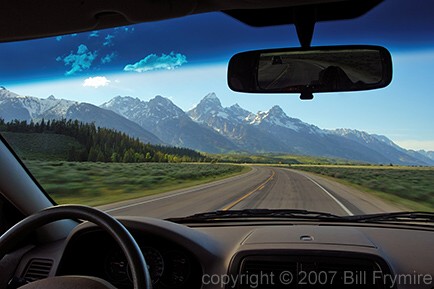 driving vehicle through Grand Tetons