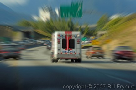 speeding ambulance in city