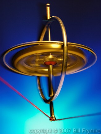 gyroscope balancing on a string