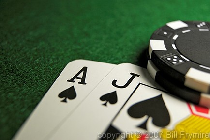 blackjack hand with poker chips