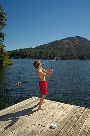 boy fishing off dock Shawnigan