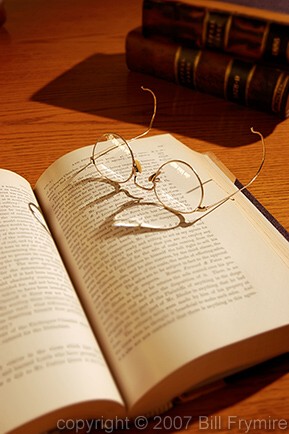 law books with glasses