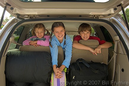 portrait of children in minivan