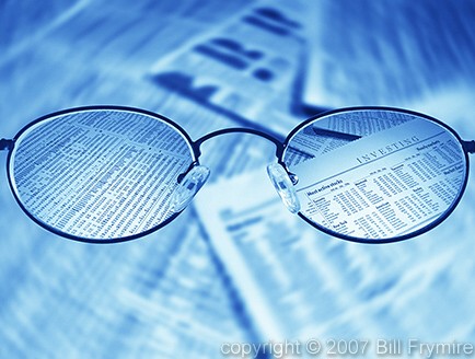 focused-investing-glasses-stock-market-sheet