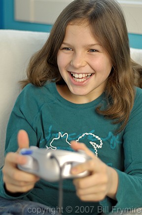 Girl playing game system