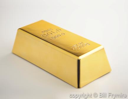 Gold bar on white background