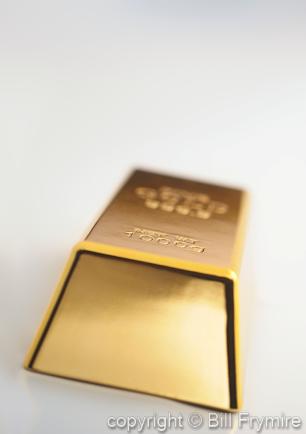 Gold bar on white background