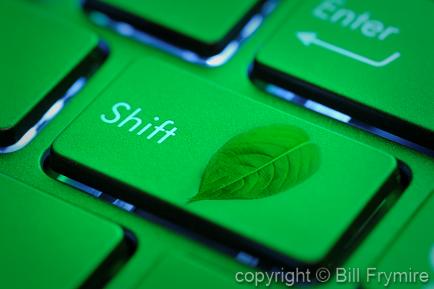 Green Computer keyboard with leaf on key