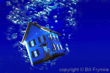 house sinking under water