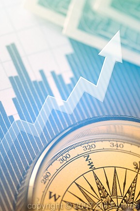 compass with business charts