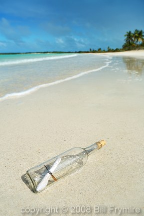 Message in a bottle on beach