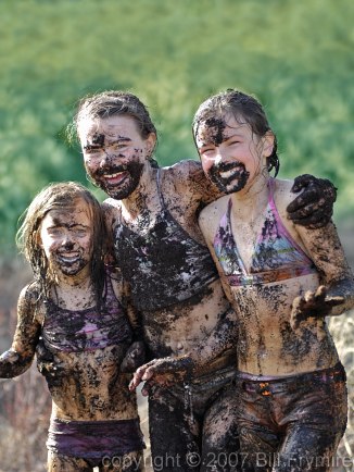 girls covered in mud