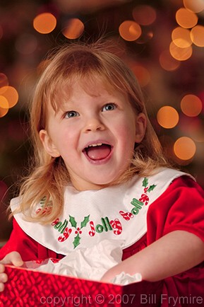 Girl opening Christmas present