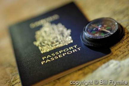    <br />passport with compass on map