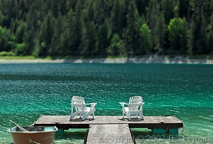 two chairs and fishing boat