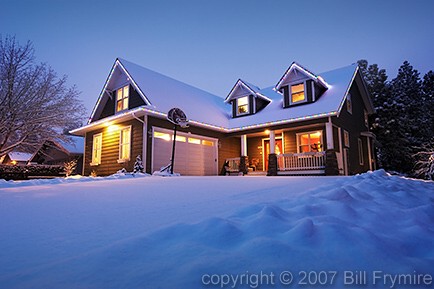 house in winter with fresh snowfall