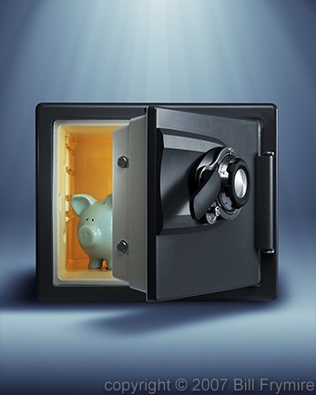 piggy bank inside of combination safe