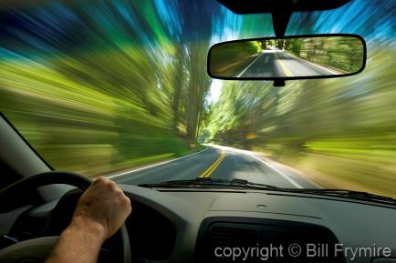 driver speeding on road