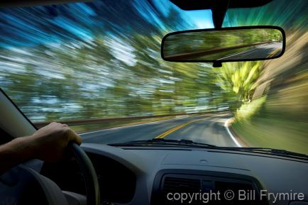 driver turning around corner