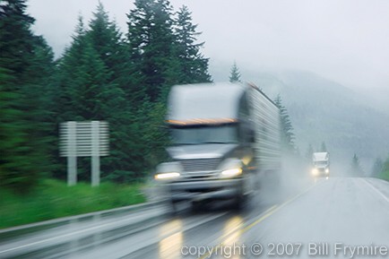 blurred transport truck in the rain