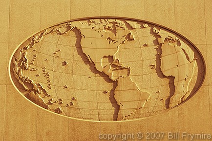 oval world map on side of building Salt Lake City