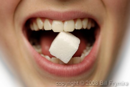 Sugar Cube between Teeth