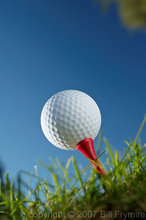 worm's eye view of a golf ball on tee