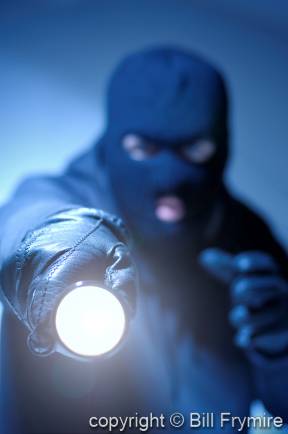 thief-crime-with-flashlight