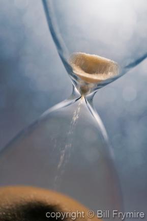 sand falling through an hourglass