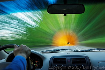 vehicle driving into tunnel