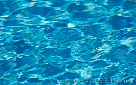 Blue pool water reflection