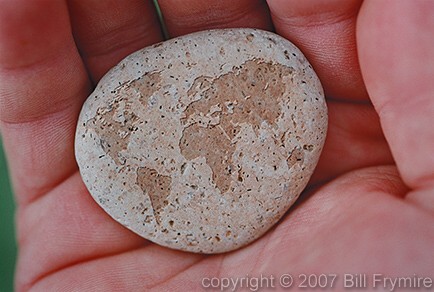 world-map-flat-rock-hand-stone