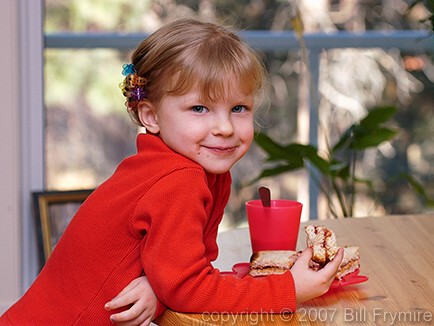 girl eating sandwich