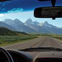 driving vehicle through Grand Tetons