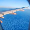 Airplane Wing and Clouds