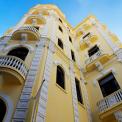 yellow apartment building Cuba