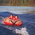 two children water tubing