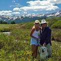 couple walking dog 