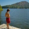 boy fishing off dock