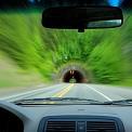 driving vehicle through approaching tunnel