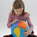 child holding world in her lap
