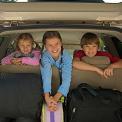 portrait of children in minivan