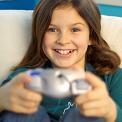 Tween girl playing game system 