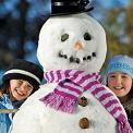 Two girls with snowman