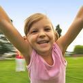 Close up of young girl spinning