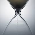 Sand falling through the hourglass
